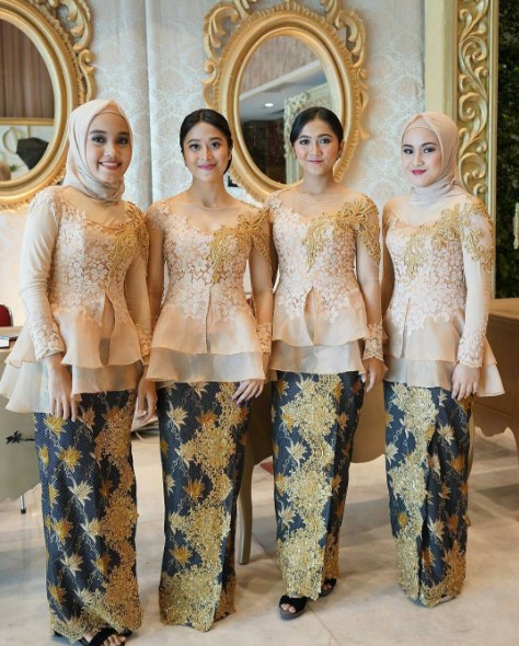 Baju Kebaya Brokat Terbaru Model Peplum Kuning Gold
